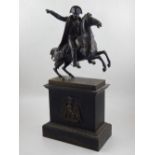 A late 19th century bronze study of Napoleon, posed on a rearing horse and raised on a rectangular