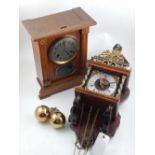 A German eight day mantle clock, the silvered dial with Arabic numerals, the ash case with