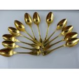 A set of twelve continental gilded tea spoons, fiddle and thread pattern