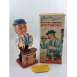 Rosko Toys 'Charley Weaver' bartender, with original box, H. 29cm.