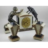 An Art Deco marble and bonze mantle clock garniture, modelled with a young girl and a goat, the gilt