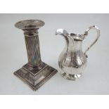 A Victorian silver cream jug, George Richards, London 1854, of ribbed baluster form, together with a