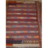 A Lori kelim rug, decorated with bands of red, black and orange, fringed. L. 146cm