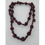 A 9ct yellow gold mounted garnet bead cluster necklace.