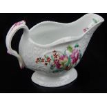 A Philip Christian Liverpool porcelain sauce boat, circa 1770, the moulded body exterior and