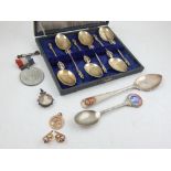 A boxed set of six silver apostle spoons, Sheffield 1871, with gilt-washed bowls, together with a