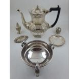 A small quantity of silver plate, including a teapot of octagonal reeded and foliate form,