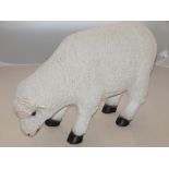 A resin cast model of a sheep grazing, W. 57cm.