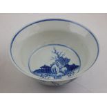 A Chinese blue and white rice bowl, the exterior decorated with pagoda in landscape,