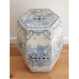 A Chinese blue and white barrel form garden seat, hexagonal and decorated with flowers, H. 47cm.