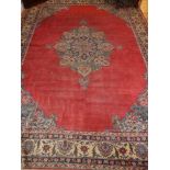 A Tabriz rug, decorated with tear drop medallion to centre, fringed, 370x260cm.