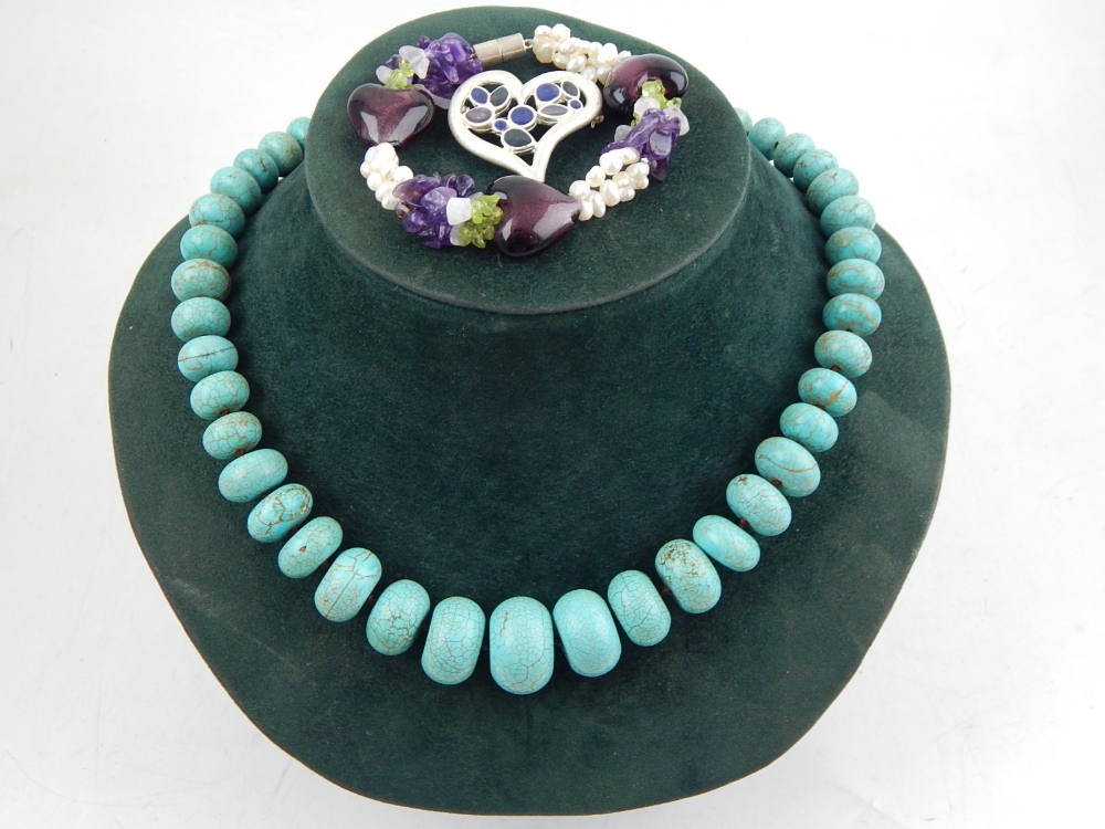 A turquoise beaded necklace,