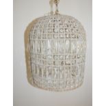 A bell shaped ceiling light shade, the wire frame set with crystals, H. 49cm.