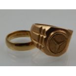 A gold wedding band, marked as 9ct, together with a signet ring, bearing marks 585 14kt, 20g.