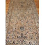 A Tabriz cream ground rug, of typical foliate design, 241 x 150cm.