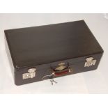 An early 20th century Japanese black lacquer suit case, with chrome fittings, W.