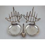 Two matching silver five division toast racks, Sheffield 1921 & 1945,