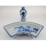A late 18th century Chinese blue and white hor d'oeuvres dish segment, decorated with figures