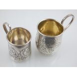 A 19th century Russian white metal measuring cup, bright cut decoration, bears purity mark to