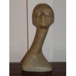 A 1960's stylised swan neck shop window mannequin head, in a marbled finish, signed and dated in