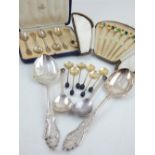 A pair of silver seal topped spoons, Sheffield 1929, with planished bowls, together with a pair of