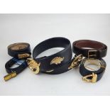 A collection of five leather belts, to include Dunhill and others.