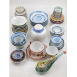 A quantity of Chinese ceramics, including a blue and white ginger jar, rice bowls and spoons and