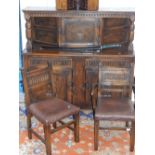 A Korean hardwood table cabinet, with brass fittings, opening to reveal an interior fitted with