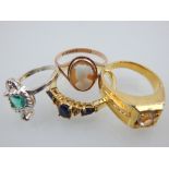 A 9ct yellow gold and cameo ring, together with two yellow metal dress rings, one set with