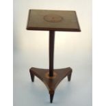 A Sheraton revival mahogany small occaisional table with square paterae inlaid top on octagonal