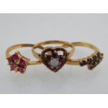 a 9ct yellow gold ruby and opal heart shaped cluster ring, together with a 9ct yellow gold ruby
