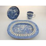 An late 18th / early 19th century blue and white porcelain cup and saucer, together with a blue