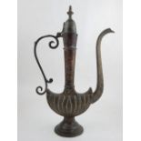 Indo Persian decorative vessel, of flattened form with long neck and spout. H. 30cm
