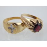 A 9ct yellow gold garnet ring, oval cut central stone, together with a 9ct yellow gold ring, set