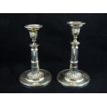 A pair of silver plated telescopic candlesticks.