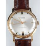 A Donada 17 jewels gentleman's wristwatch, with baton numerals, silvered dial and brown leather