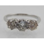 An 18ct white gold and three stone diamond ring, diamonds of approx. 1.4ct combined.