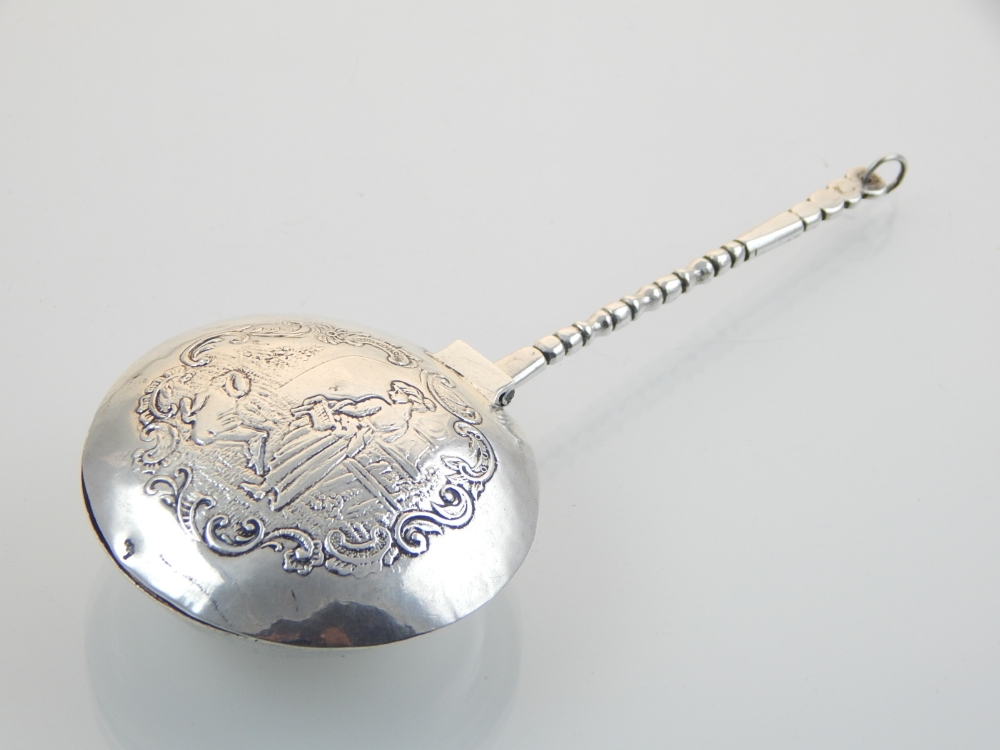 A Continental white metal miniature warming pan, in the Dutch style.
