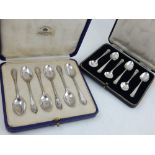 A mid 20th century cased set of six silver tea spoons, Mappin & Webb Sheffield, together with a