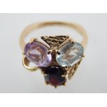 9ct yellow gold, amethyst, garnet and aquamarine cluster dress ring.