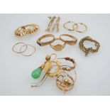 Three 9ct yellow gold rings, together with yellow metal hoop earrings and others.