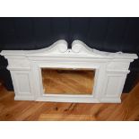 A late Victorian cast iron overmantle mirror with swan neck pediment W 80 cms