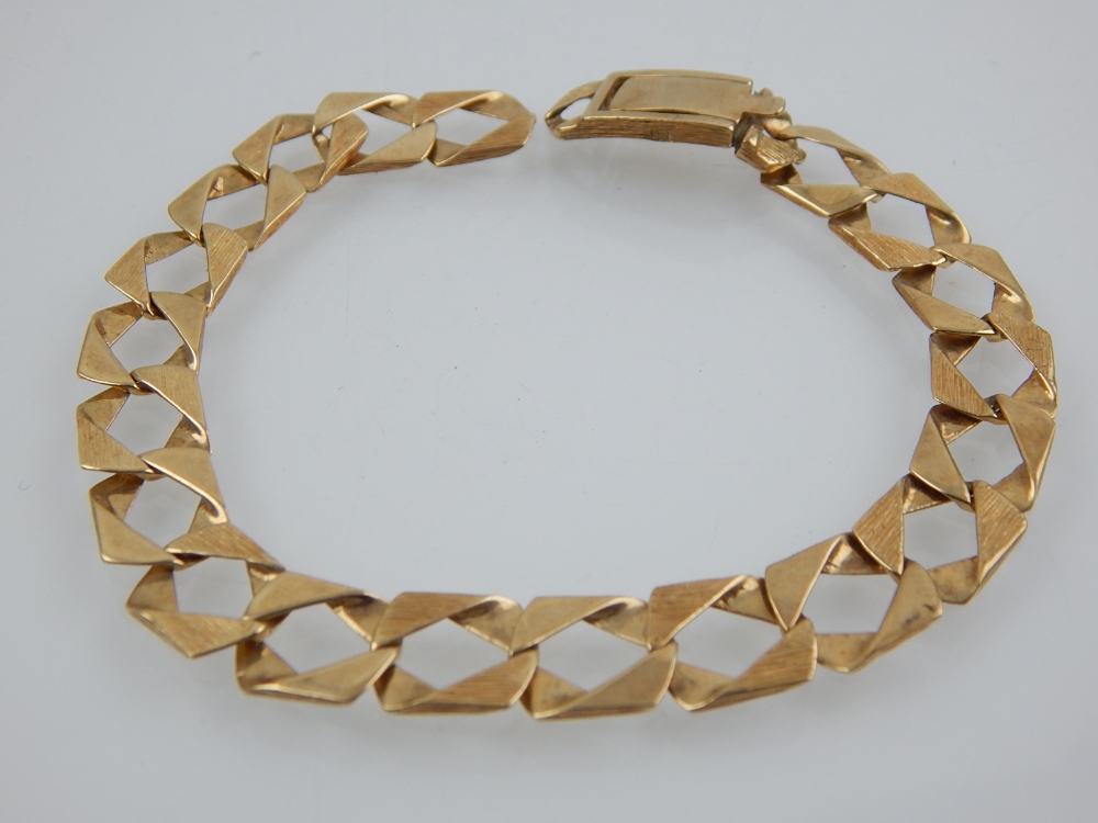 A 9ct yellow and white gold bangle, together with a 9ct yellow gold flat link bracelet, total weight