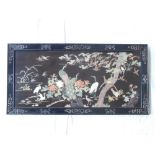 An early 20th century black lacquer and hardstone rectangular panel, depicting exotic birds