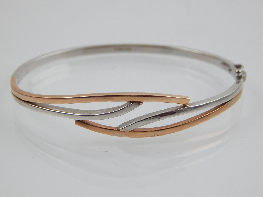 A 9ct yellow and white gold bangle, together with a 9ct yellow gold flat link bracelet, total weight - Image 2 of 2