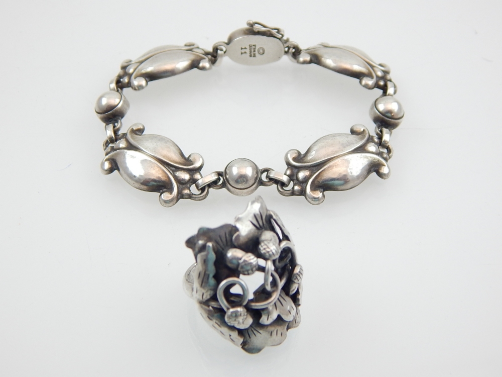 A Georg Jensen Sterling Silver Moonlight Blossom bracelet, clasp stamped and numbered 11, together