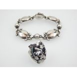 A Georg Jensen Sterling Silver Moonlight Blossom bracelet, clasp stamped and numbered 11, together