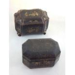 A mid 19th century Chinese export black laquer tea caddy of octagonal form, gilt decorated with