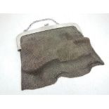 A George V silver mesh purse with chain handle, London 1917. 14 oz gross.