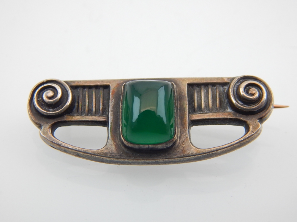 A German Arts and Crafts silver brooch by Theodor Fahrner for Murrie bennet & Co, inset cabouchon